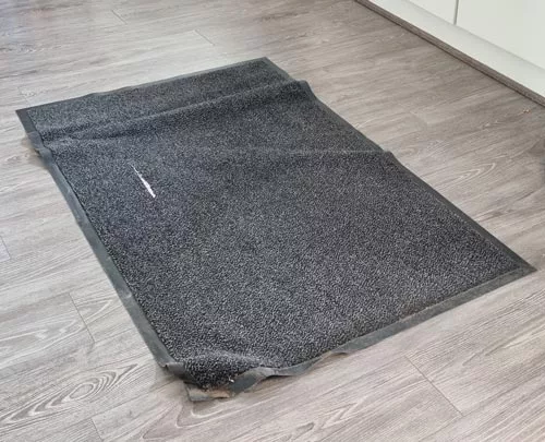 Entrance Matting Benefits & Considerations | Why Is It Important for Your Business? 4 Badly worn entrance mat